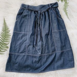 A-line denim style midi skirt with pockets and tie